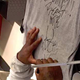 Illustration for article titled Marshawn Lynch Signs Patriots Shirt Beast Mode U Bitch